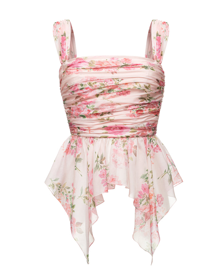 JEAN, A BABY PINK CORSET TOP WITH AN ASYMMETRICAL PEPLUM, ADORNED WITH MEDIUM-SIZED PINK FLOWERS