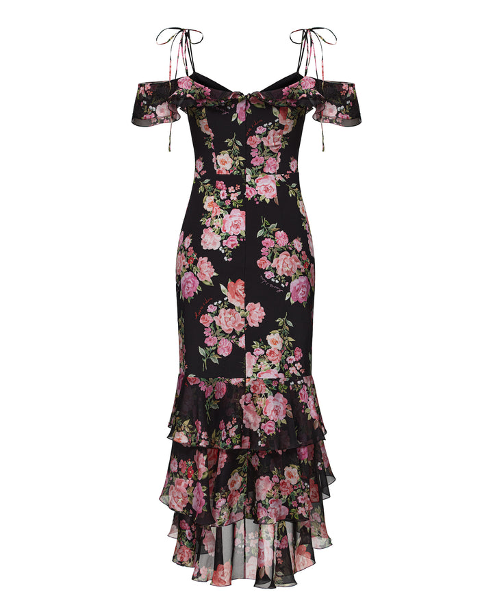 MONICA, A BLACK MAXI DRESS WITH SHORT SLEEVES AND RUFFLES, ADORNED WITH MEDIUM-SIZED PINK FLOWERS