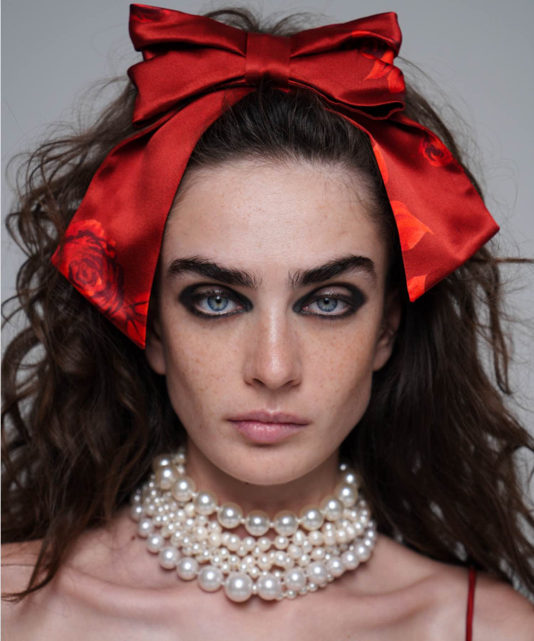Mirella, hairclip bow made of burgundy satin with red flowers