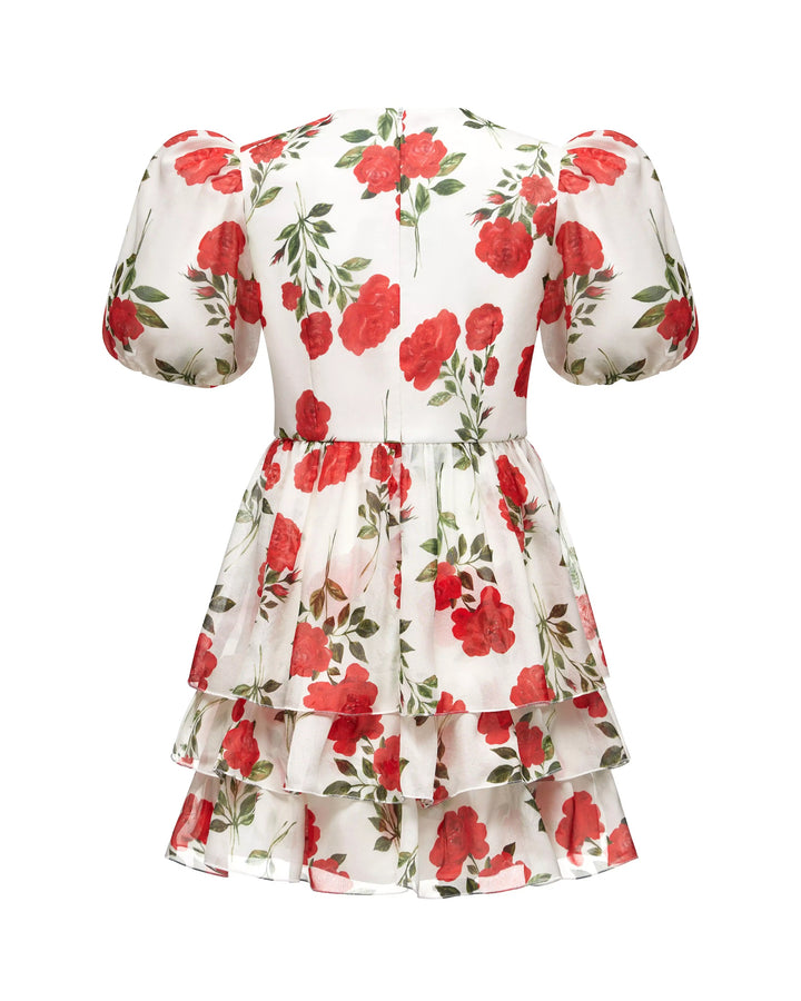 FIFI, A CHILDREN'S DRESS IN CREAMY WHITE WITH MEDIUM-SIZED RED FLOWERS