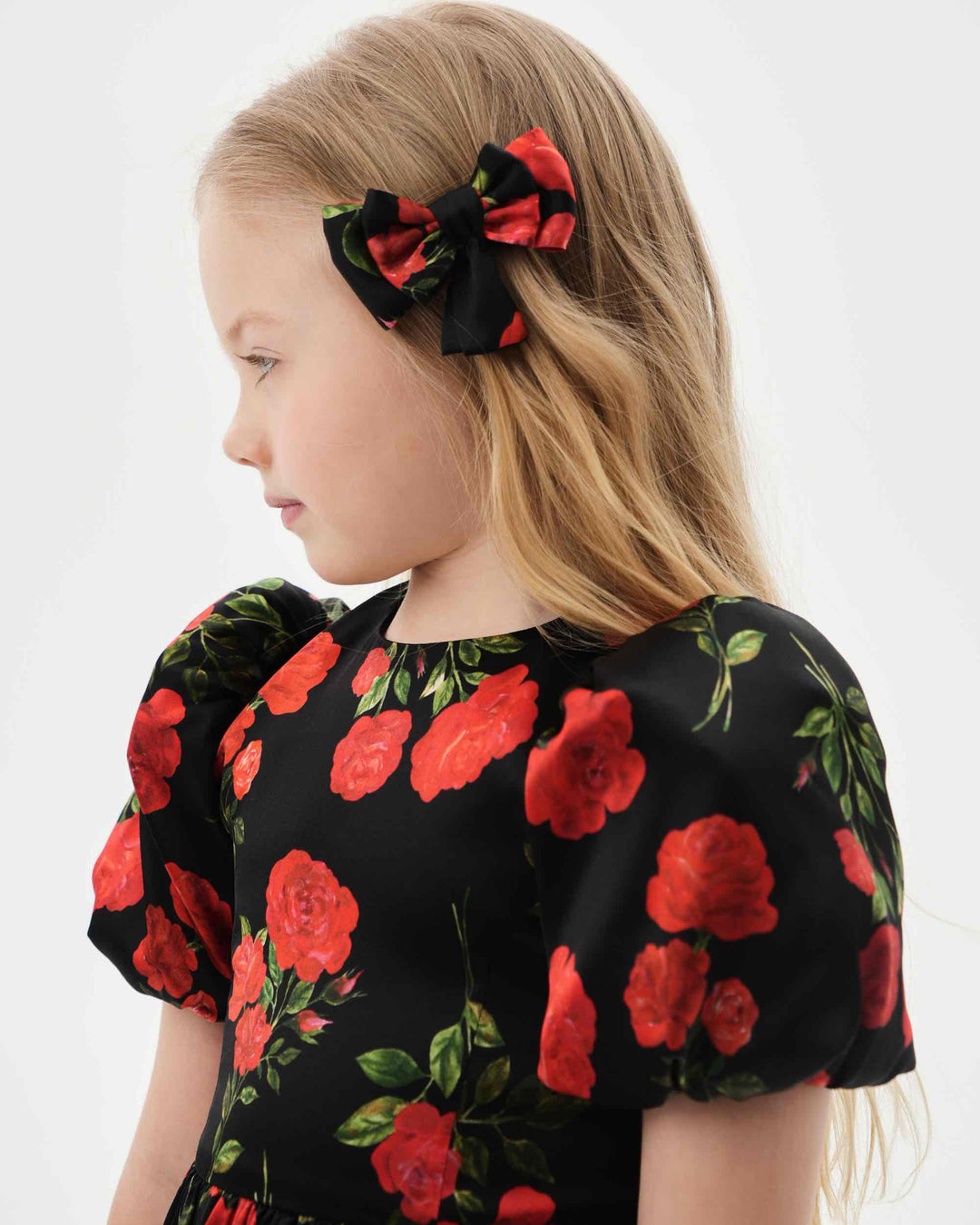 MIMI, CHILDREN’S BOW HAIR CLIP BLACK WITH RED ROSE PRINT