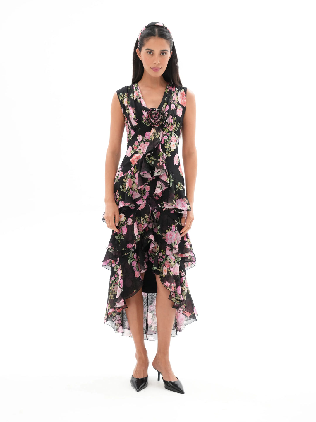 BEATA, A BLACK MIDI DRESS ADORNED WITH MEDIUM-SIZED PINK FLOWERS