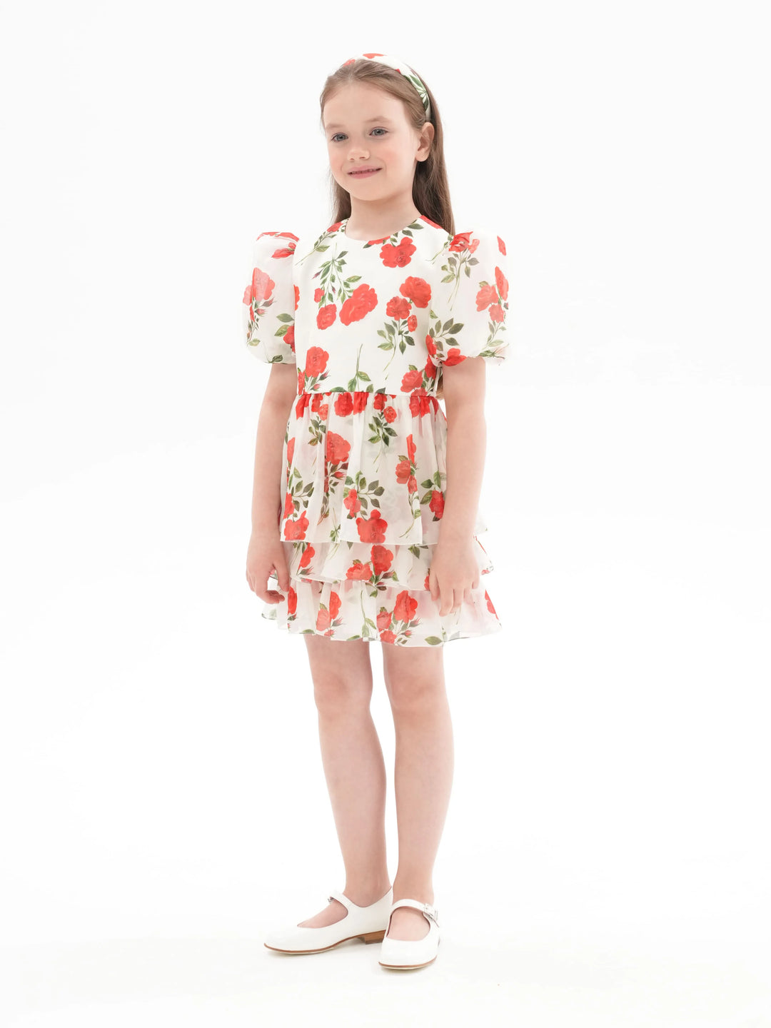 FIFI, A CHILDREN'S DRESS IN CREAMY WHITE WITH MEDIUM-SIZED RED FLOWERS