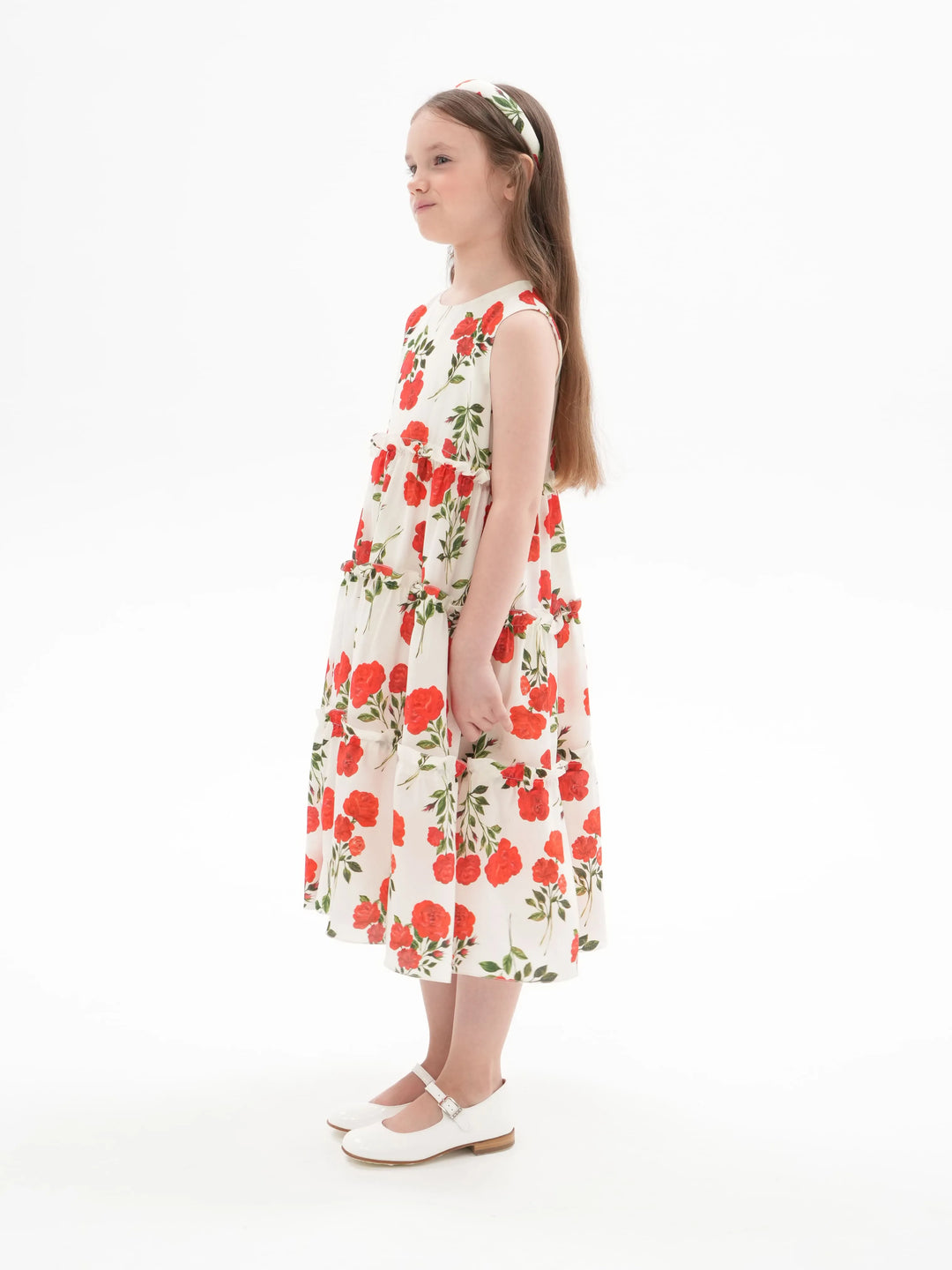 ALISA, A CHILDREN'S DRESS IN CREAMY WHITE WITH MEDIUM-SIZED RED FLOWERS