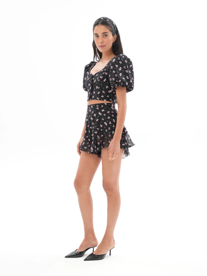 AUDRIE, MINI SHORTS WITH RUFFLES, BLACK WITH SMALL RASPBERRY FLOWERS