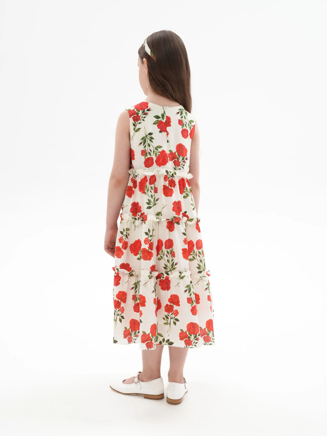 ALISA, A CHILDREN'S DRESS IN CREAMY WHITE WITH MEDIUM-SIZED RED FLOWERS