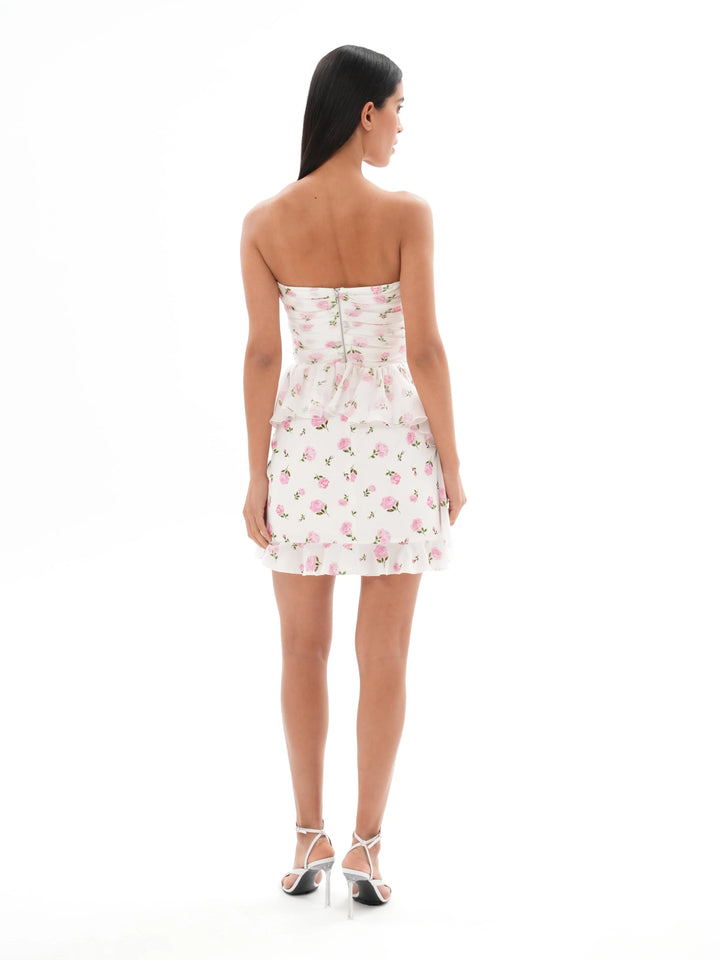 JOAN CORSET TOP WITH ASYMMETRICAL PEPLUM, MILKY WHITE ADORNED WITH MEDIUM PINK FLOWERS