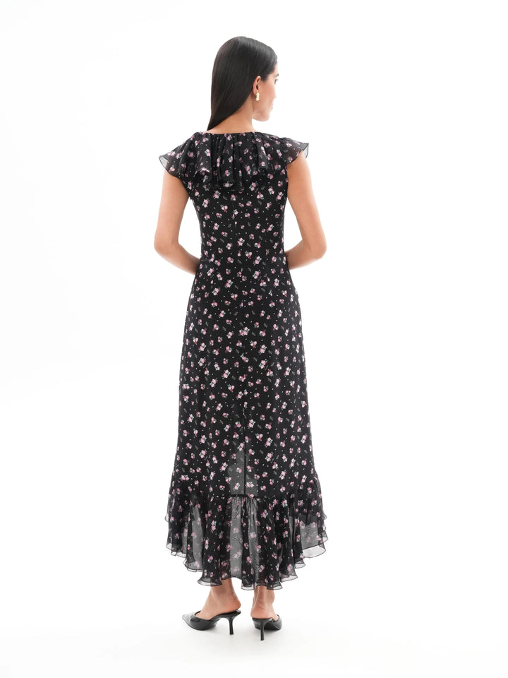 ANNETE, A SLEEVELESS MIDI DRESS WITH RUFFLES, IN BLACK ADORNED WITH DELICATE RASPBERRY FLOWERS